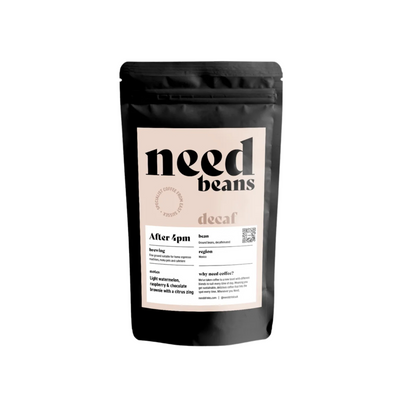 Coffee bean package labeled 'need beans' on a white background