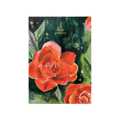 Notebook cover with red roses and 'Heart medicine' text on a white background
