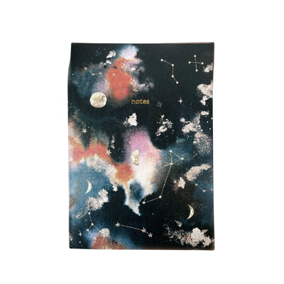 Notebook with celestial design on a white background