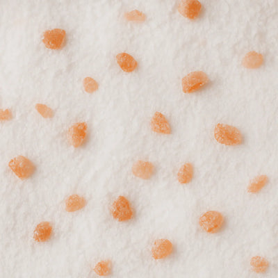 Small orange fruits on a white background