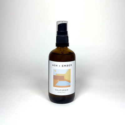 Bottle of 'Ash + Ember' product on a white background