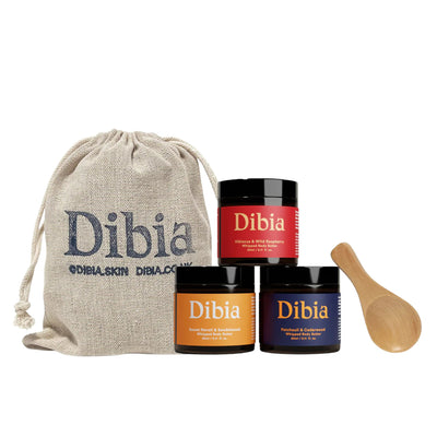 Dibia skincare products including jars and a drawstring bag on a white background