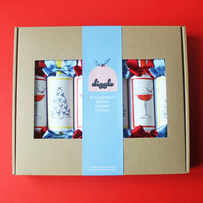 Gift box with 'digglo' branding on a red background