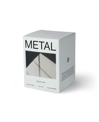 Box labeled 'Metal' with a black and white design on a white background