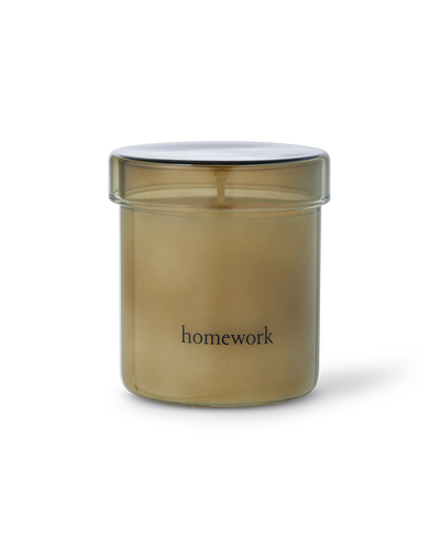 Beige jar with a white lid labeled 'homework' on a white background