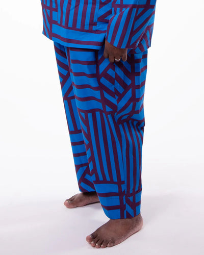 Blue and purple patterned pants on a white background