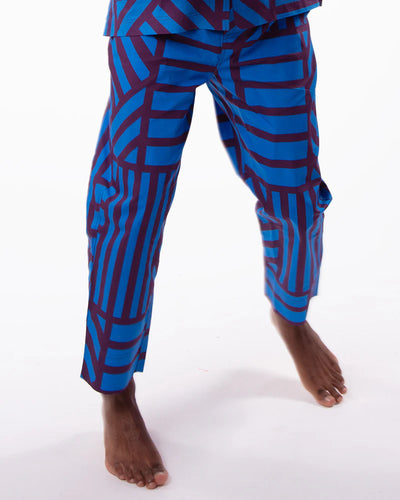 Blue patterned pants on a white background