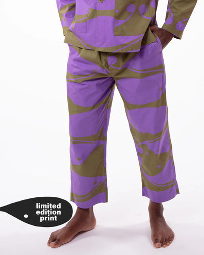 Purple and green patterned pants on a white background with 'limited edition print' text.