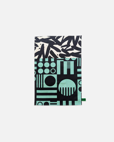 Patterned tea towel with abstract design on a white background