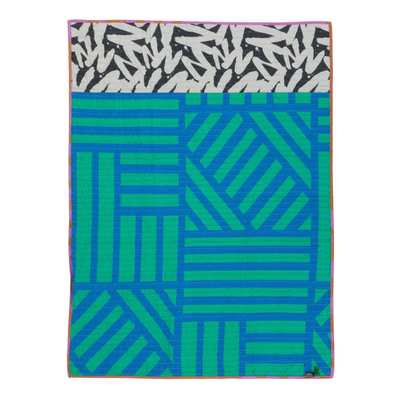 Colorful patterned towel with geometric design on a white background