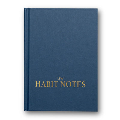 Blue notebook with 'LSW Habit Notes' text on a white background