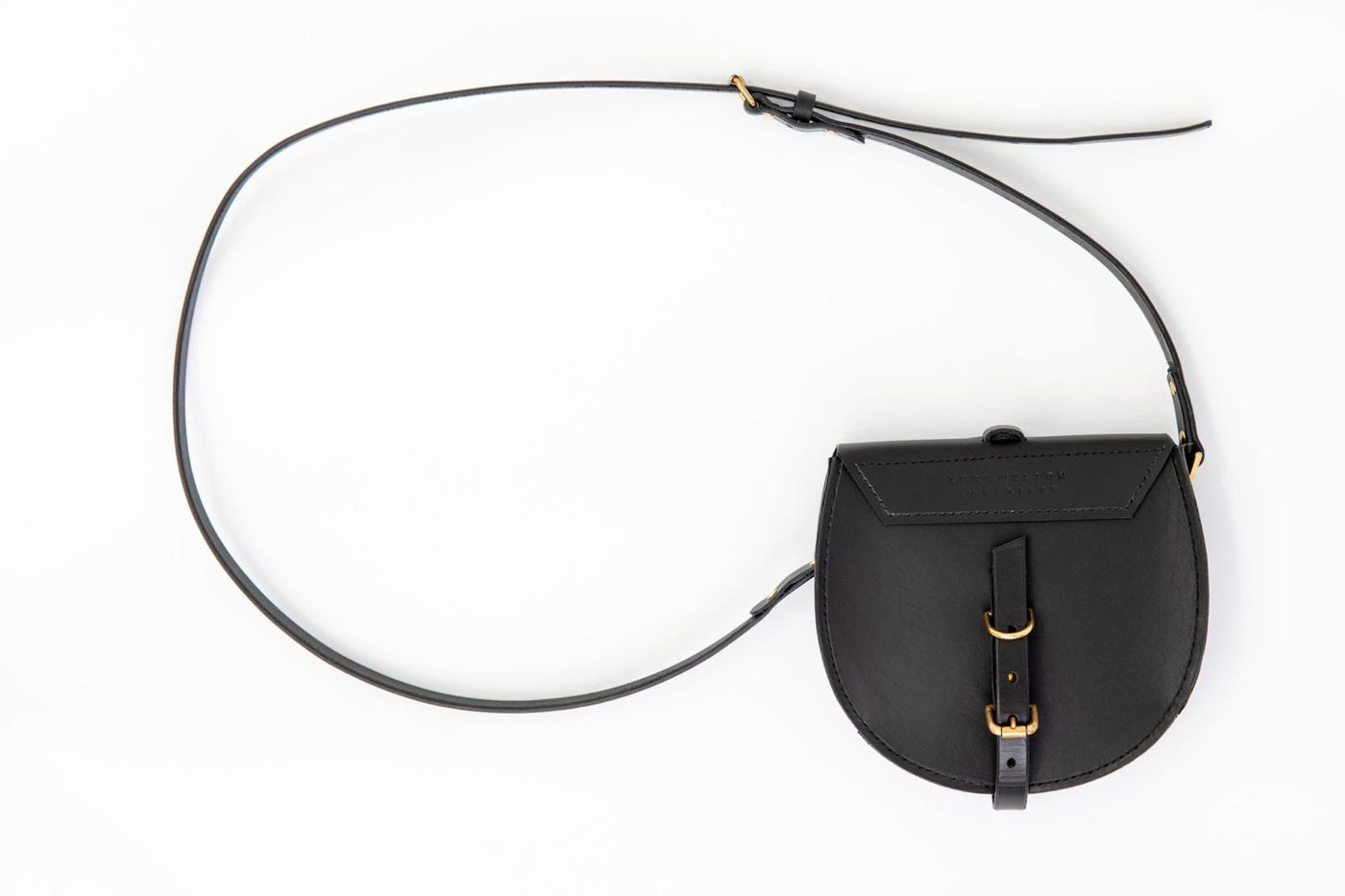 Black leather bag with a strap on a white background