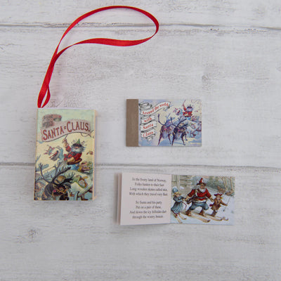 Set of vintage-style cards with illustrations and text on a wooden surface