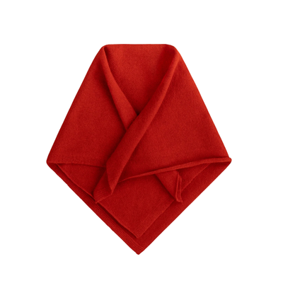 Folded red fabric on a white background