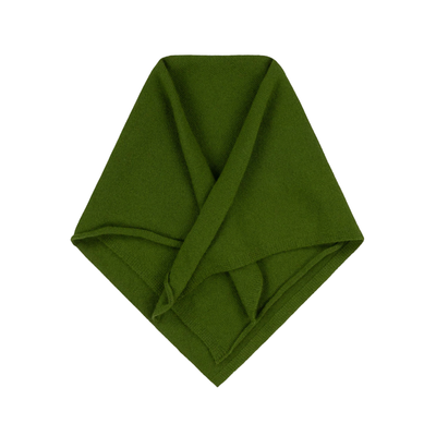 Green fabric folded into a triangle on a white background
