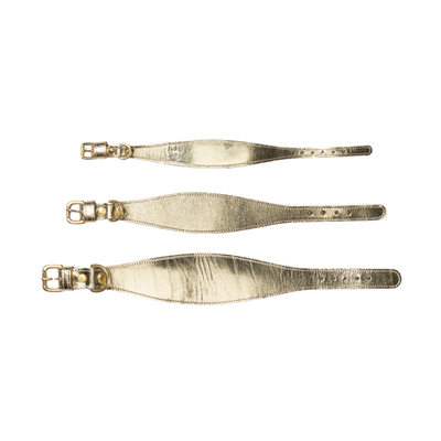 Three gold leather straps with metal buckles on a white background