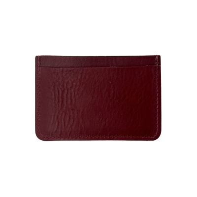 Maroon leather cardholder on a white background