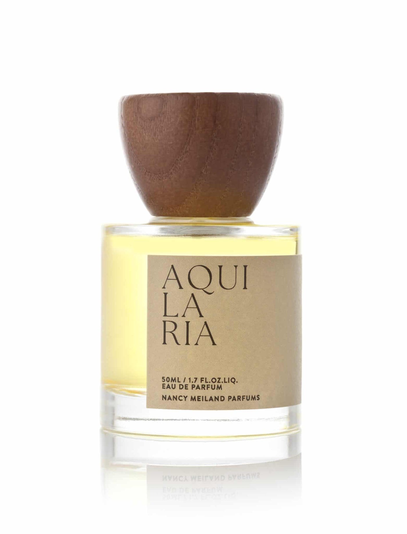 Perfume bottle with wooden cap on a white background