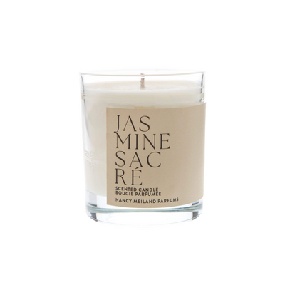 Candle with a beige label on a white background