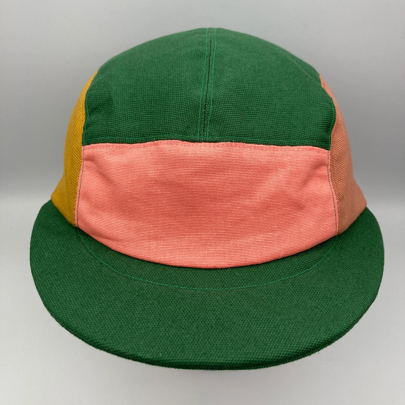 The Capalog Green, Flamingo, Mustard & Sandstone Panel Cap