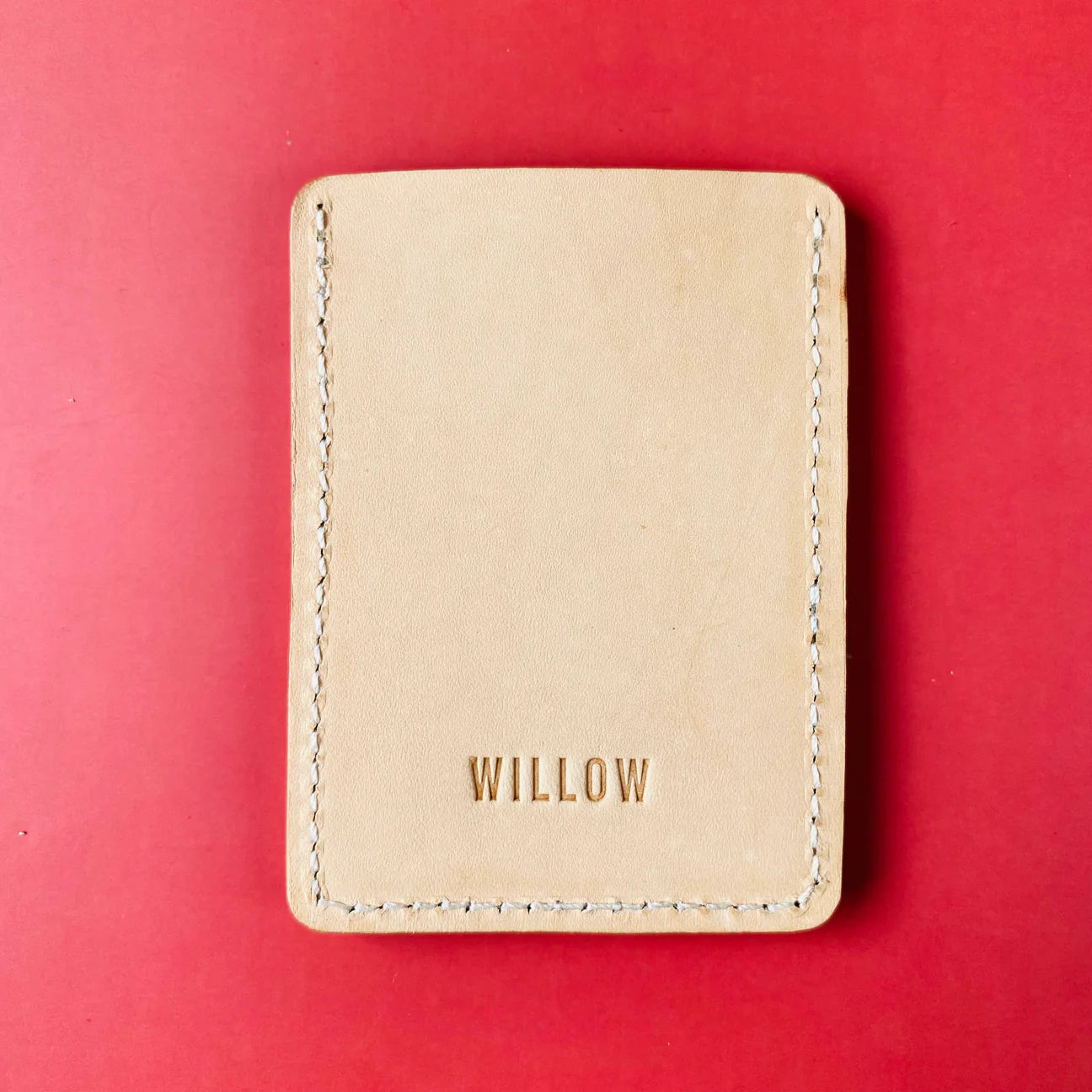Back of coin purse on red background